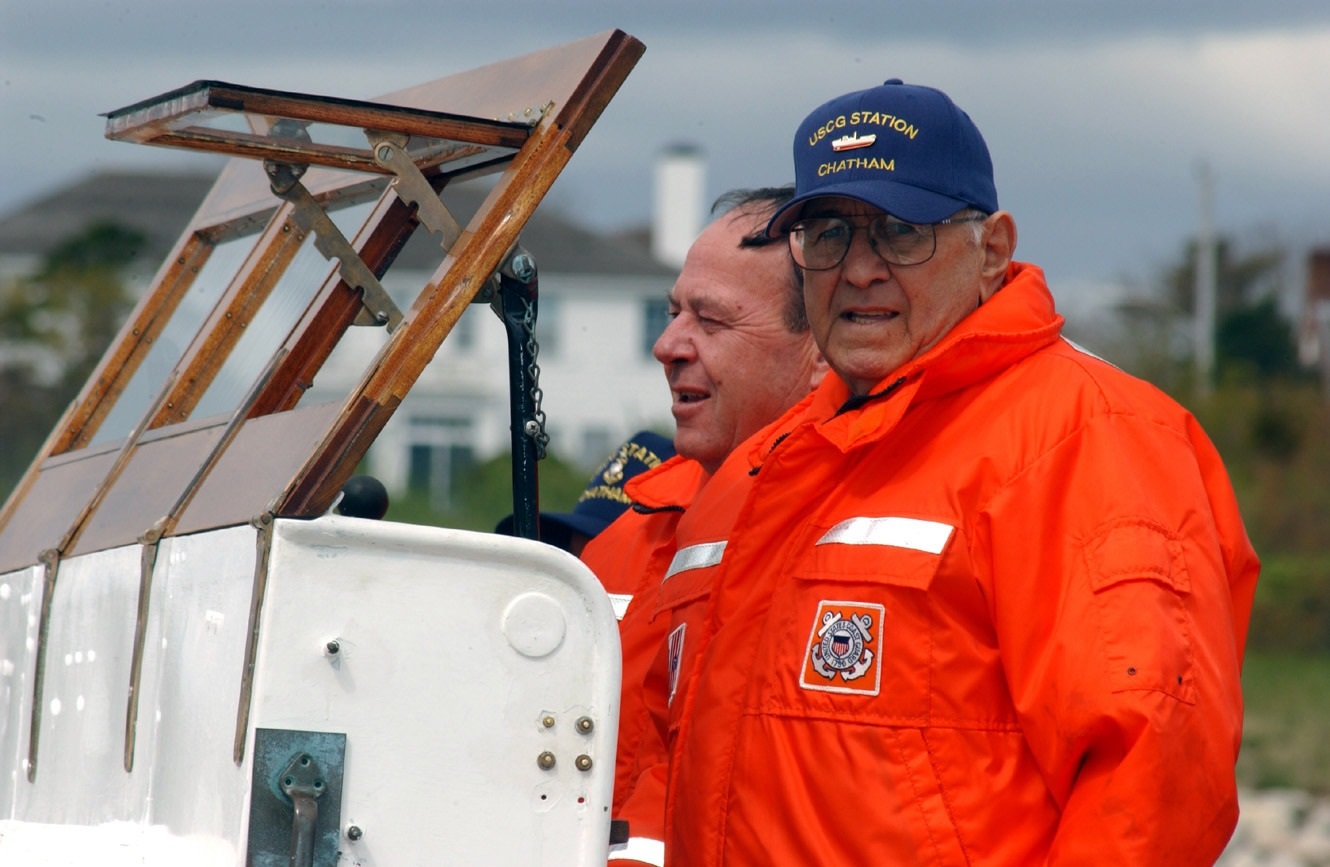 CWO Bernie Webber (USCG retired) at the helm of the restored CG-36500 accompanied by MCPO Jack Downey (USCG retired), during the 50th anniversary celebration of the famous rescue. (U.S. Coast Guard) CWO Bernie Webber (USCG retired) at the helm of the restored CG-36500 accompanied by MCPO Jack Downey (USCG retired), during the 50th anniversary celebration of the famous rescue. (U.S. Coast Guard)